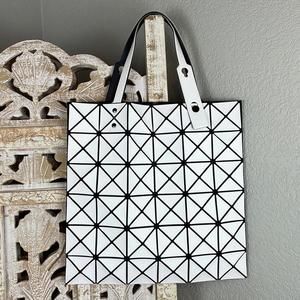 Infrequently used and in almost new state. Issey Miyake